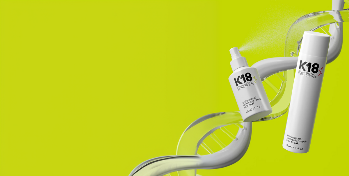 K18 professional molecular repair hair mist and mask on a lime green background with a DNA helix